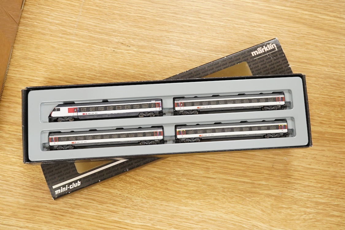 A Marklin Z gauge railway collection, Swiss railway from set 81852, including an SBB CFF FFS Bo-Bo pantograph electric locomotive, together with a boxed Mini-club unpowered 4-car set (87456), three freight wagons, a brid